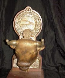 vintage bull shaped perfume vendor